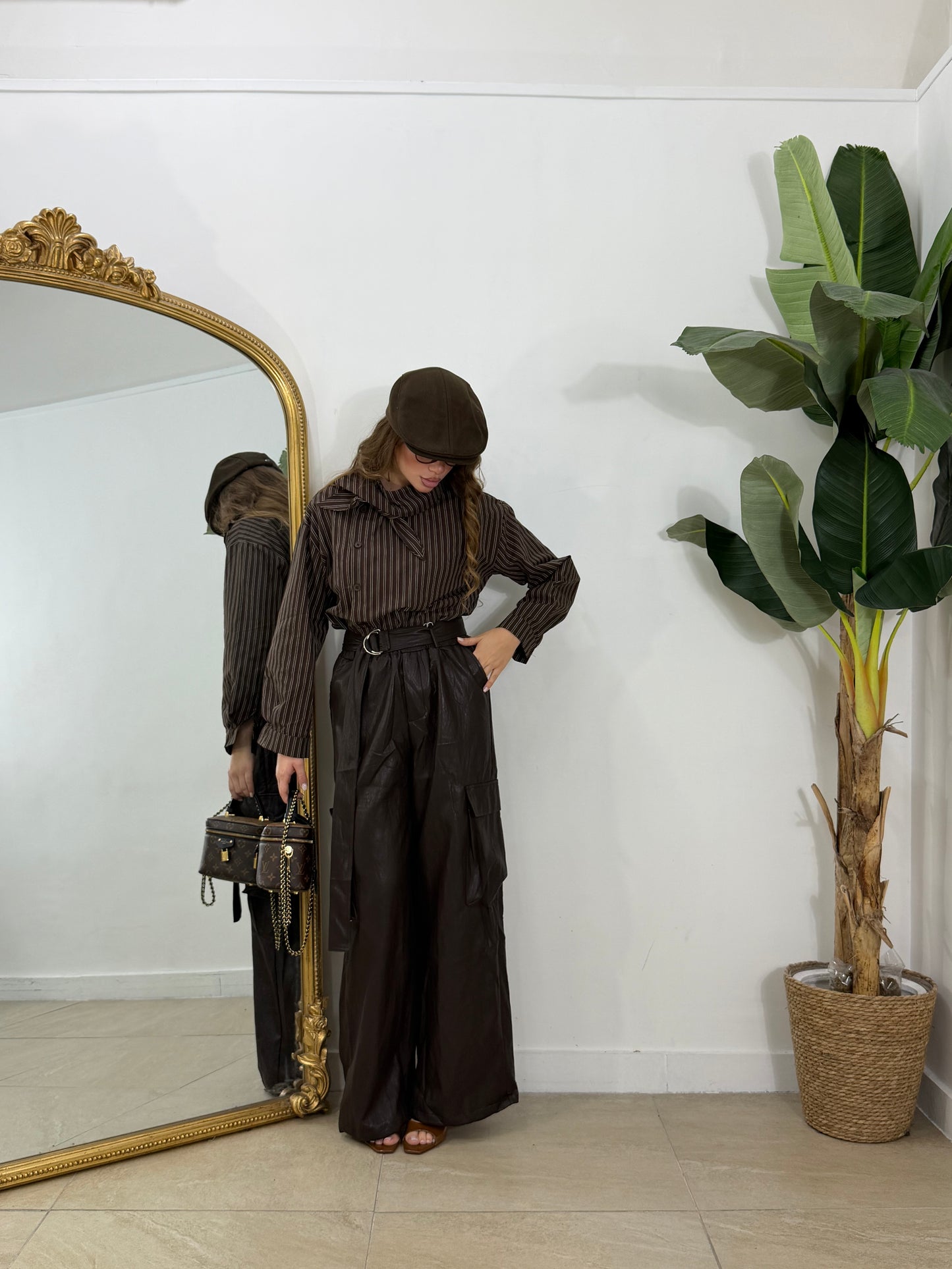 Pantalone in pelle marrone con tasche